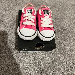 Pink and white sneakers
